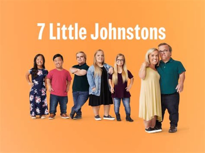 7 Little Johnstons smiling in group photo