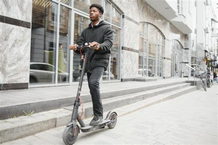 Man goes on scooter ride with girlfriend Man goes on scooter ride with girlfriend